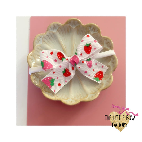 Pretty strawberry’s handtied bow